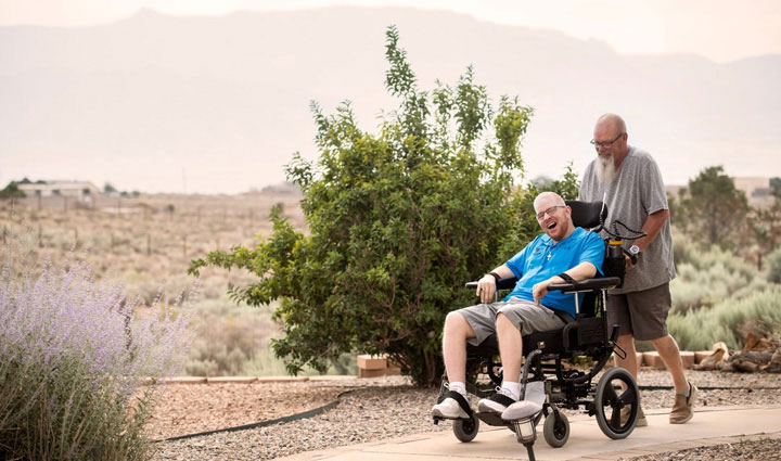 Wounded warrior Erik Schei with his father and caregiver, Gordon Schei